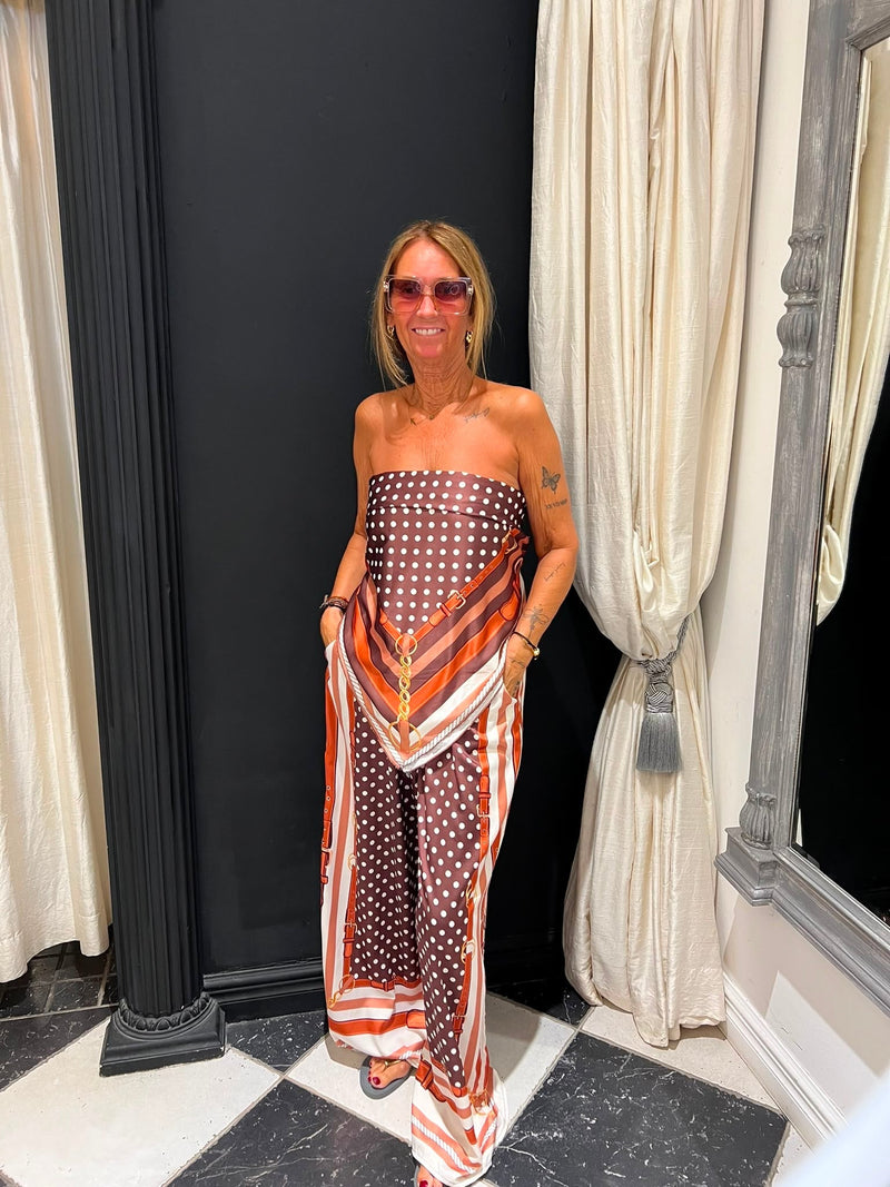 Polkadot satijn set bruin oranje — strapless gedragen, one size t/m maat 44